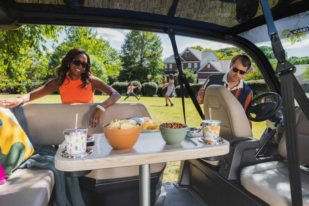 Club Car CRU with a family having a party